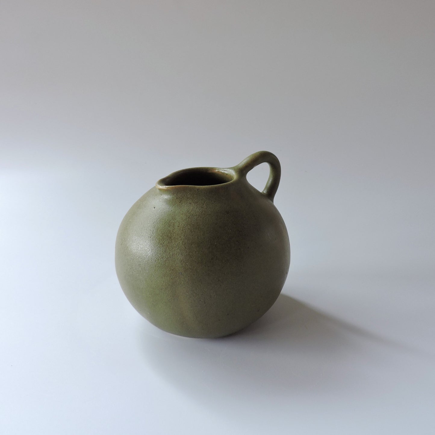 Nadine McConnell Ceramics. Sphere Jug - Olive