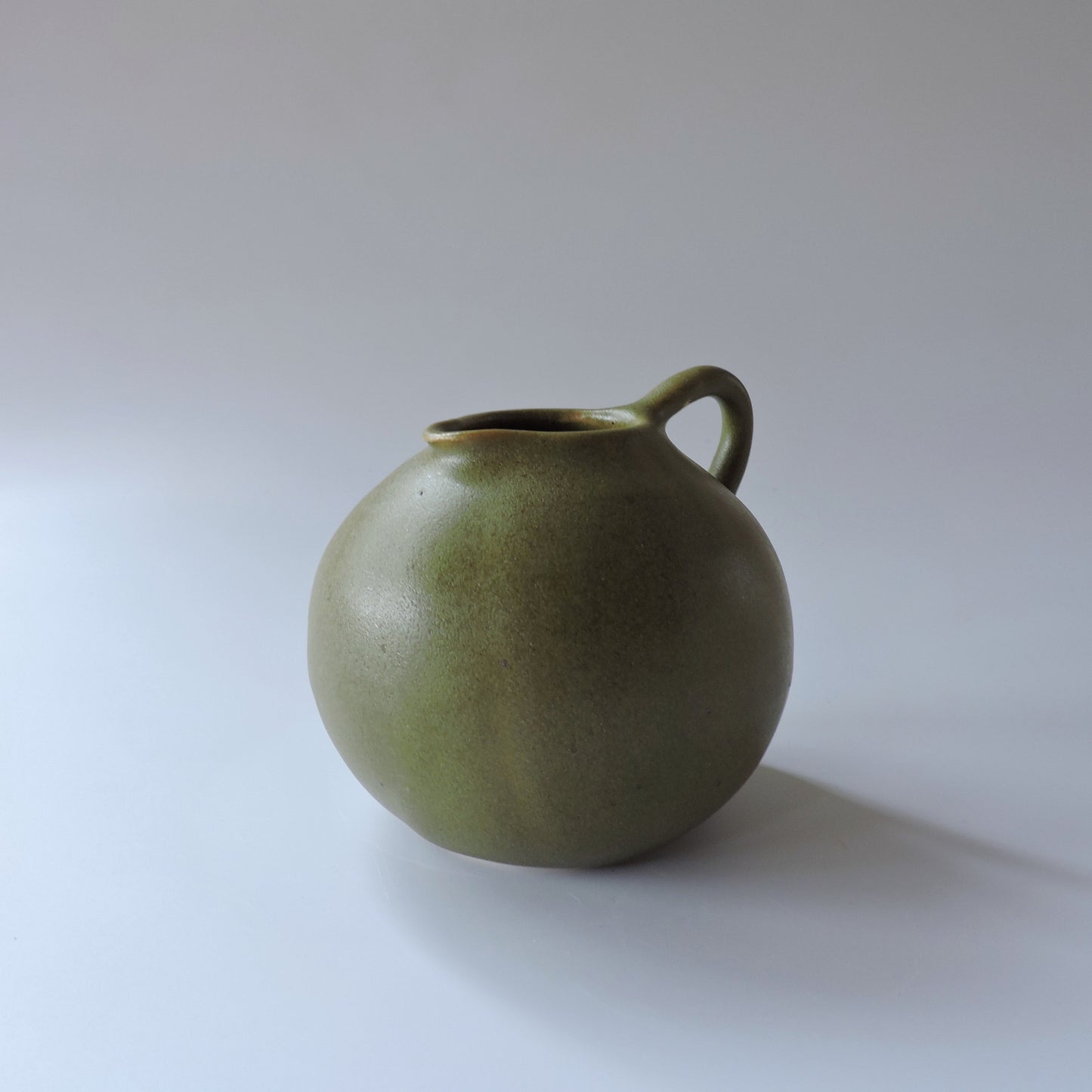 Nadine McConnell Ceramics. Sphere Jug - Olive